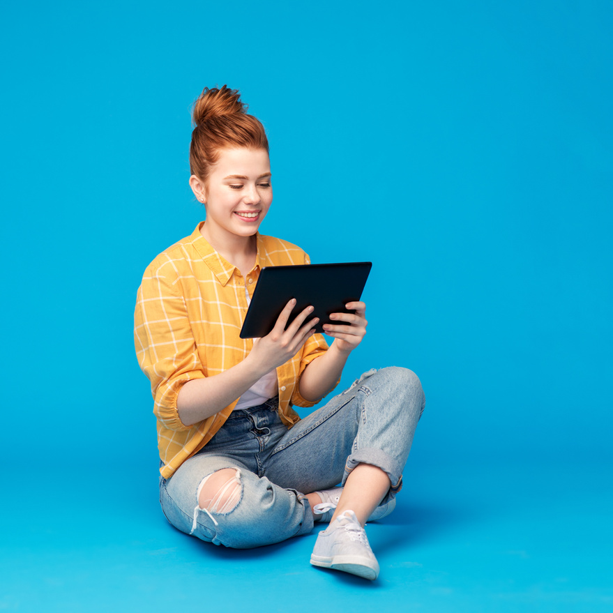Teenage Girl Using Tablet Computer